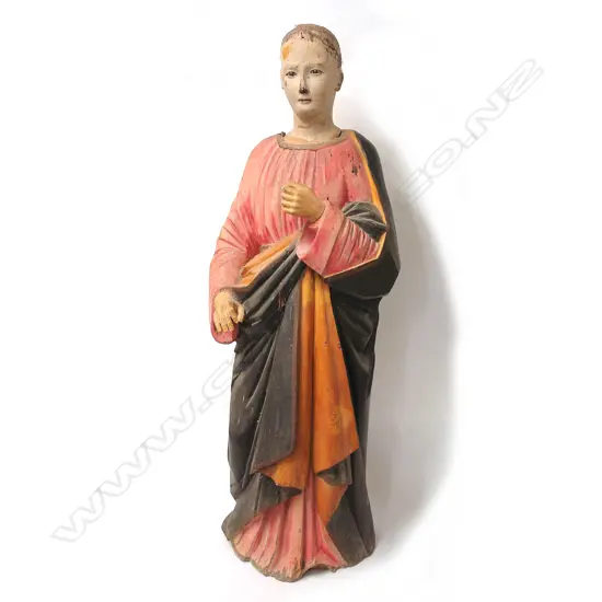 An 18th/19thC painted and carved wood figure of a saint