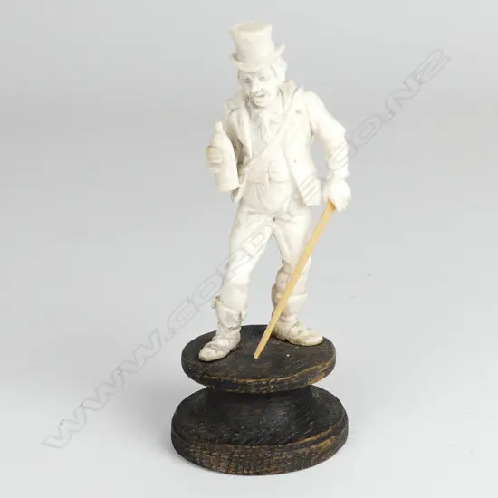 A small carved ivory figure