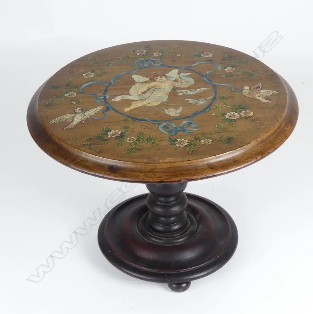 A Victorian miniature tilt top table Image 1++