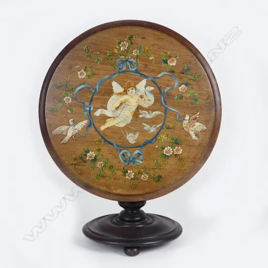 A Victorian miniature tilt top table