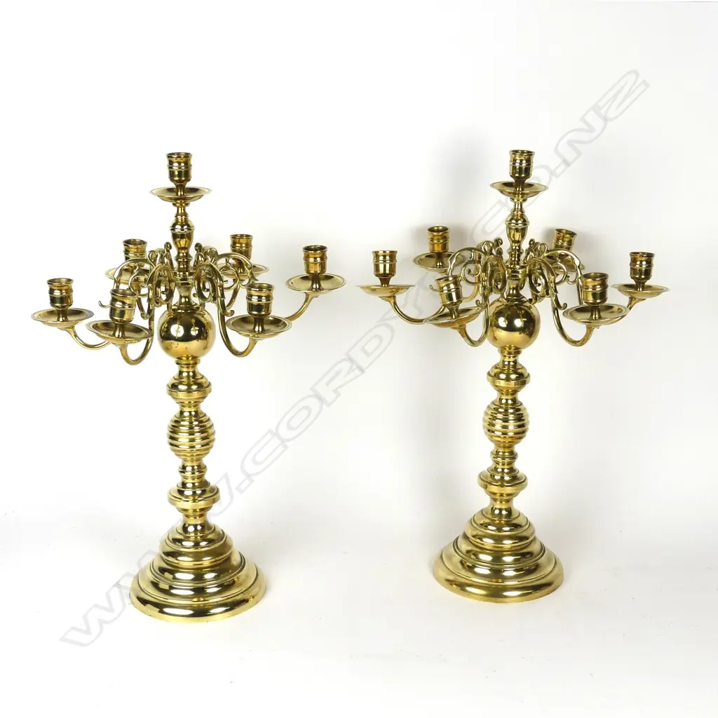 A pair of Dutch brass candelabra Image 1++