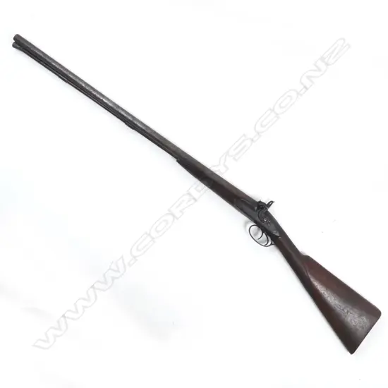 A double barrel muzzle loading percussion cap shotgun