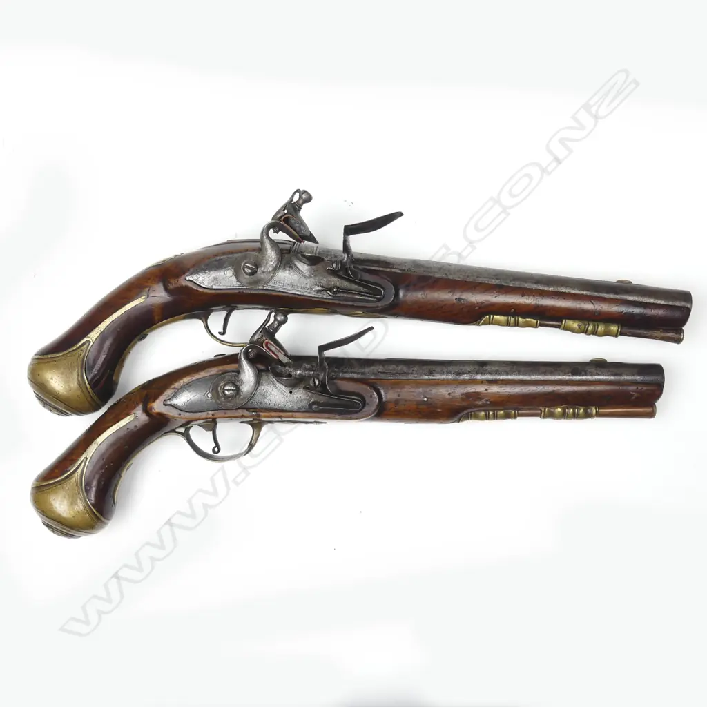 A pair of Irish flintlock coach pistols Image 1++