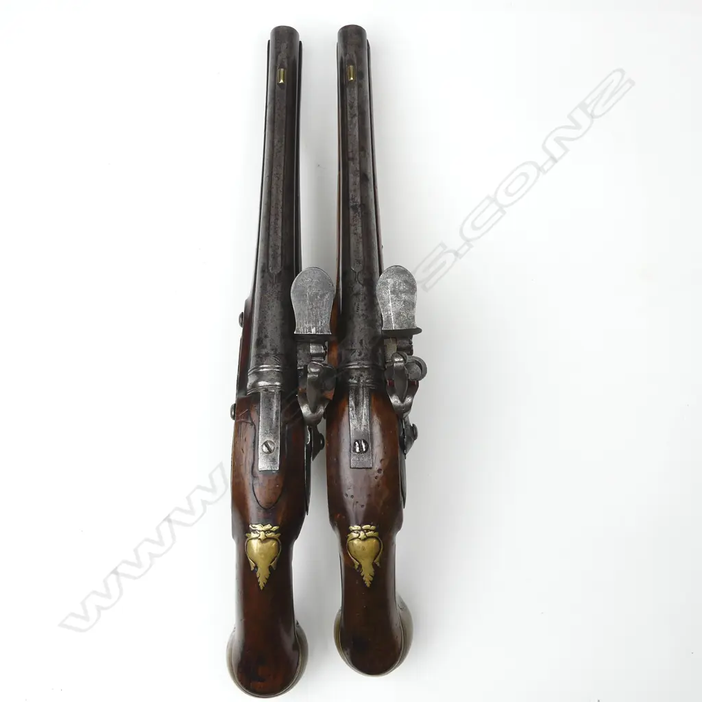 A pair of Irish flintlock coach pistols Image 1++
