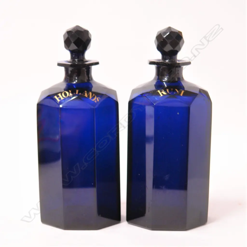 A pair of George III octagonal Bristol blue glass decanters Image 1++