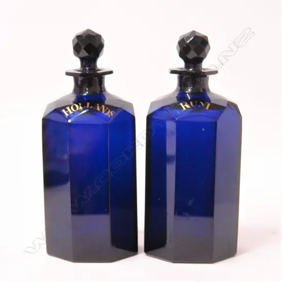 A pair of George III octagonal Bristol blue glass decanters