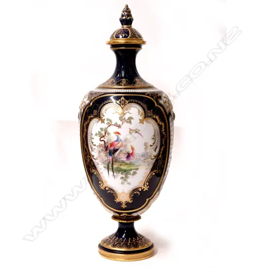 A Royal Worcester porcelain urn vase and cover