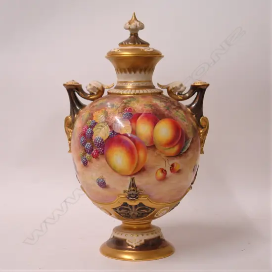A c.1960 large and impressive Royal Worcester fruit painted pedestal vase and cover by Freeman