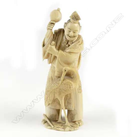 A Japanese ivory okimono