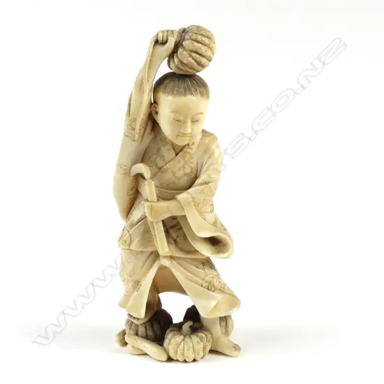 A Japanese ivory okimono
