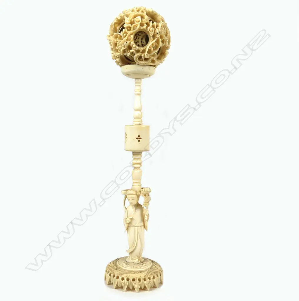 An old large Chinese carved ivory puzzle ball on stand Image 1++