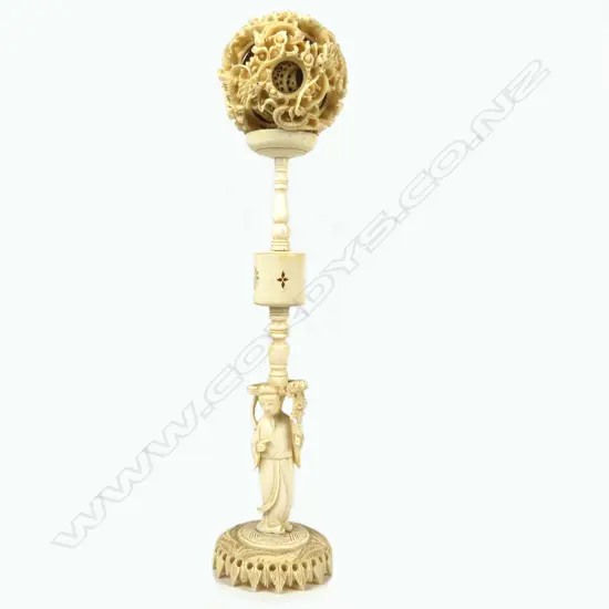 An old large Chinese carved ivory puzzle ball on stand