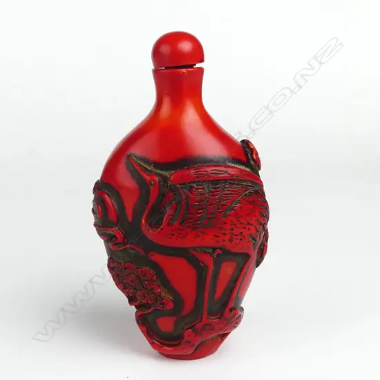 A cinnabar snuff bottle