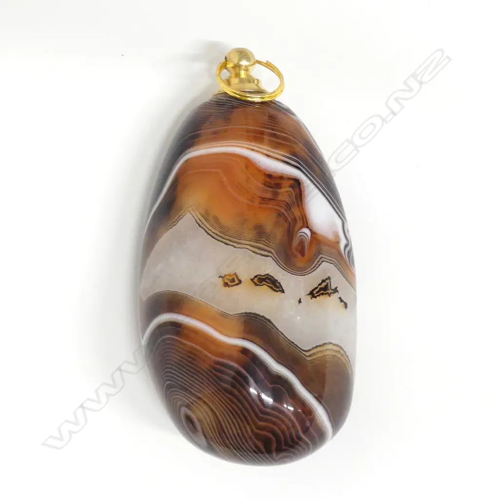 A Madagascan silk agate snuff bottle Image 1++