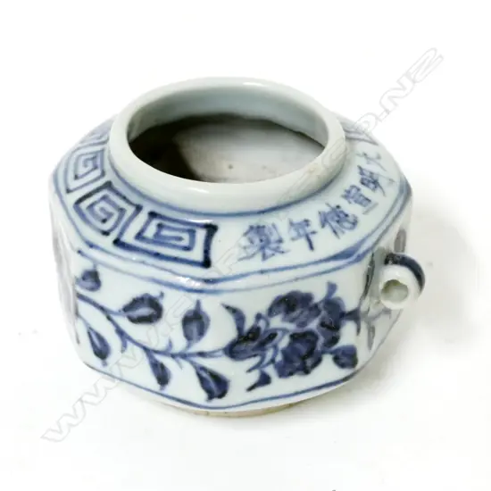 A small Chinese blue and white octagonal jar