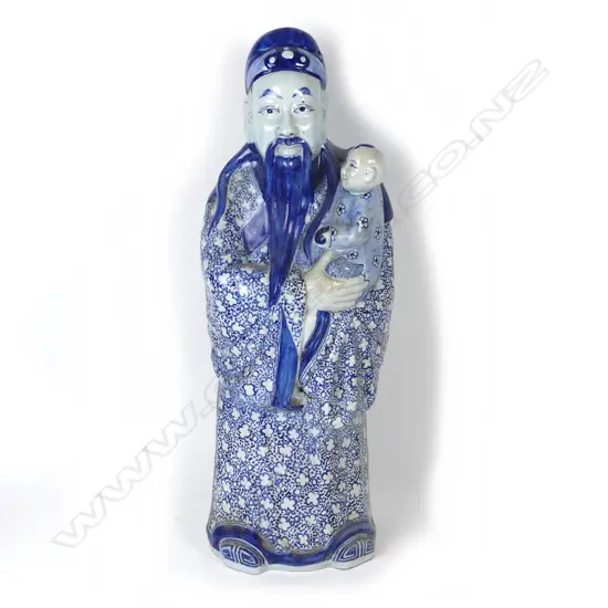 A large vintage ceramic figure of Shao Lao and child