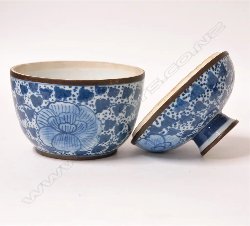 An old Chinese blue and white lidded bowl with brass mounts Image 1++
