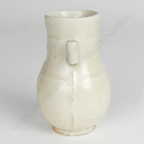 A small Chinese celadon vase