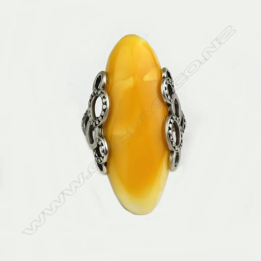 An amber and silver ring Image 1++