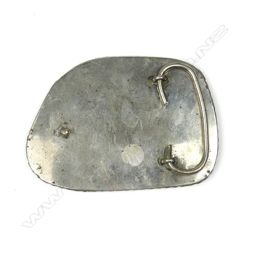 A large turquoise and silver belt buckle Image 1++
