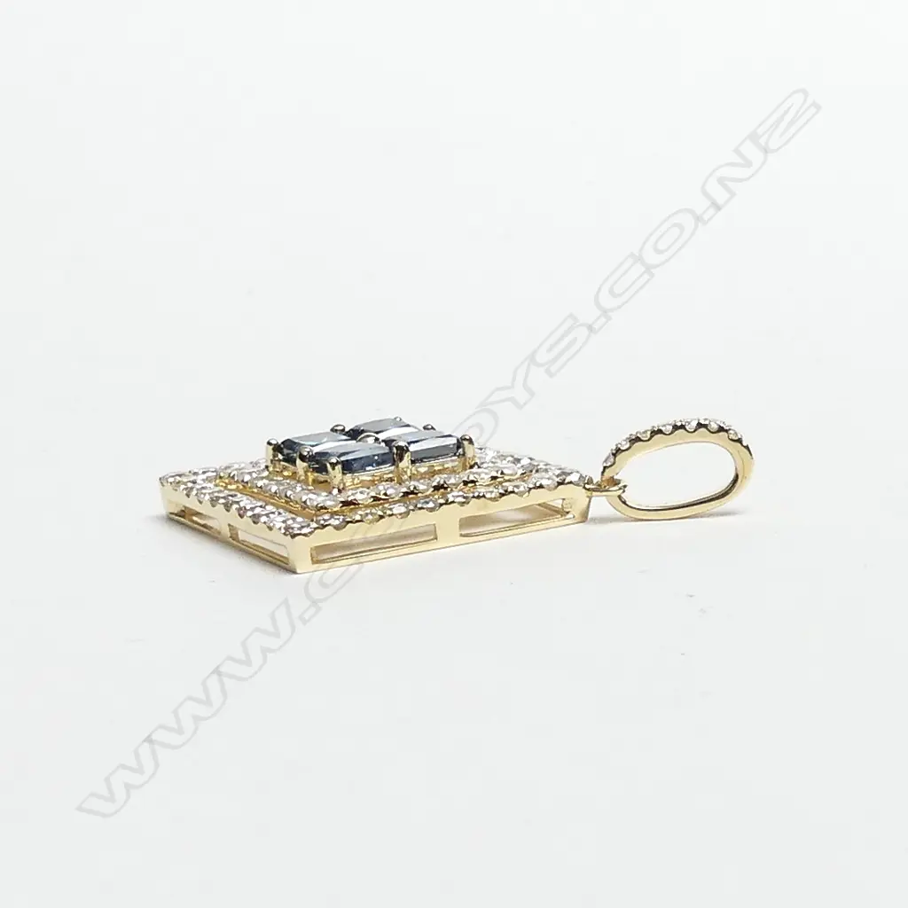 A 14ct gold and diamond pendant Image 1++