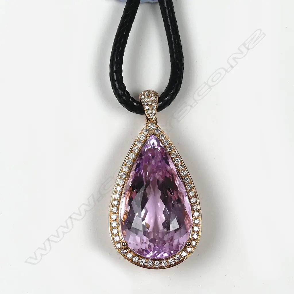 An impressive 18ct. rose gold large Kunzite and diamond pendant Image 1++