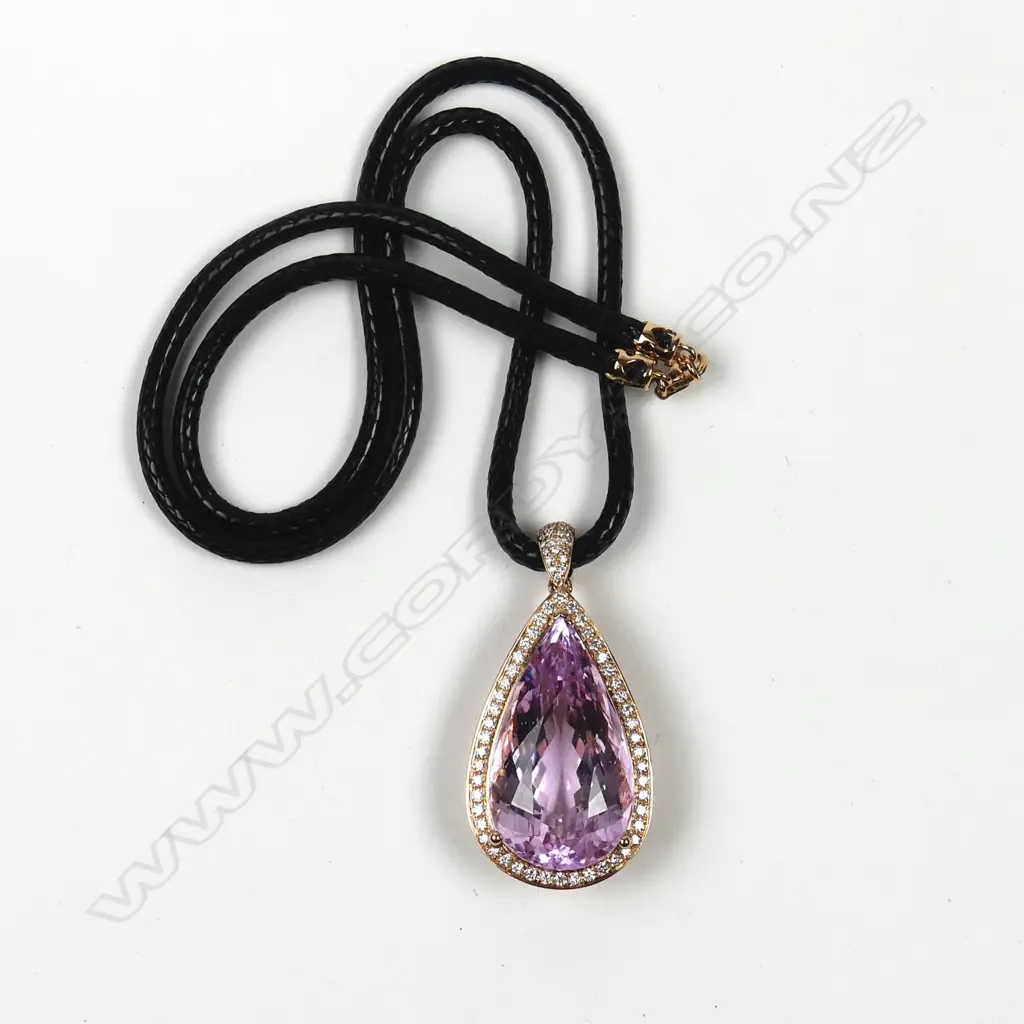An impressive 18ct. rose gold large Kunzite and diamond pendant Image 1++