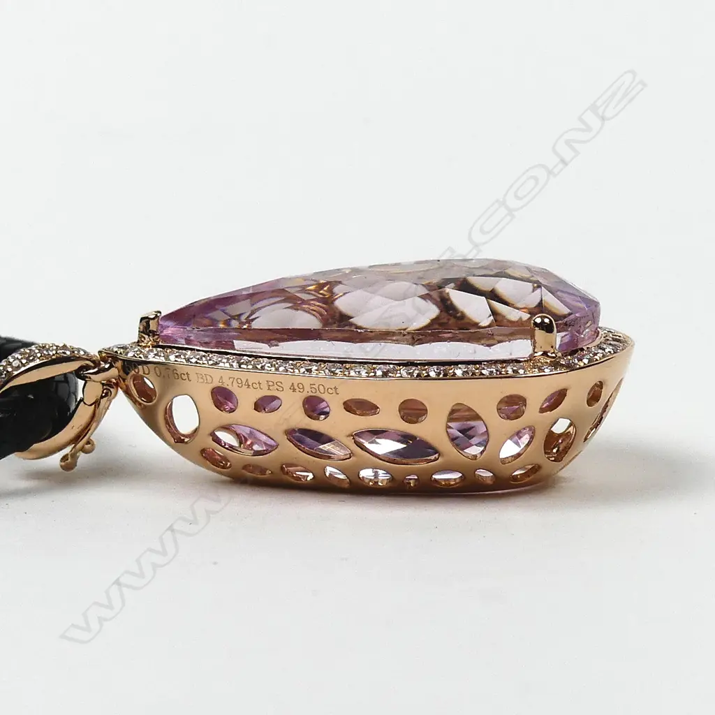 An impressive 18ct. rose gold large Kunzite and diamond pendant Image 1++
