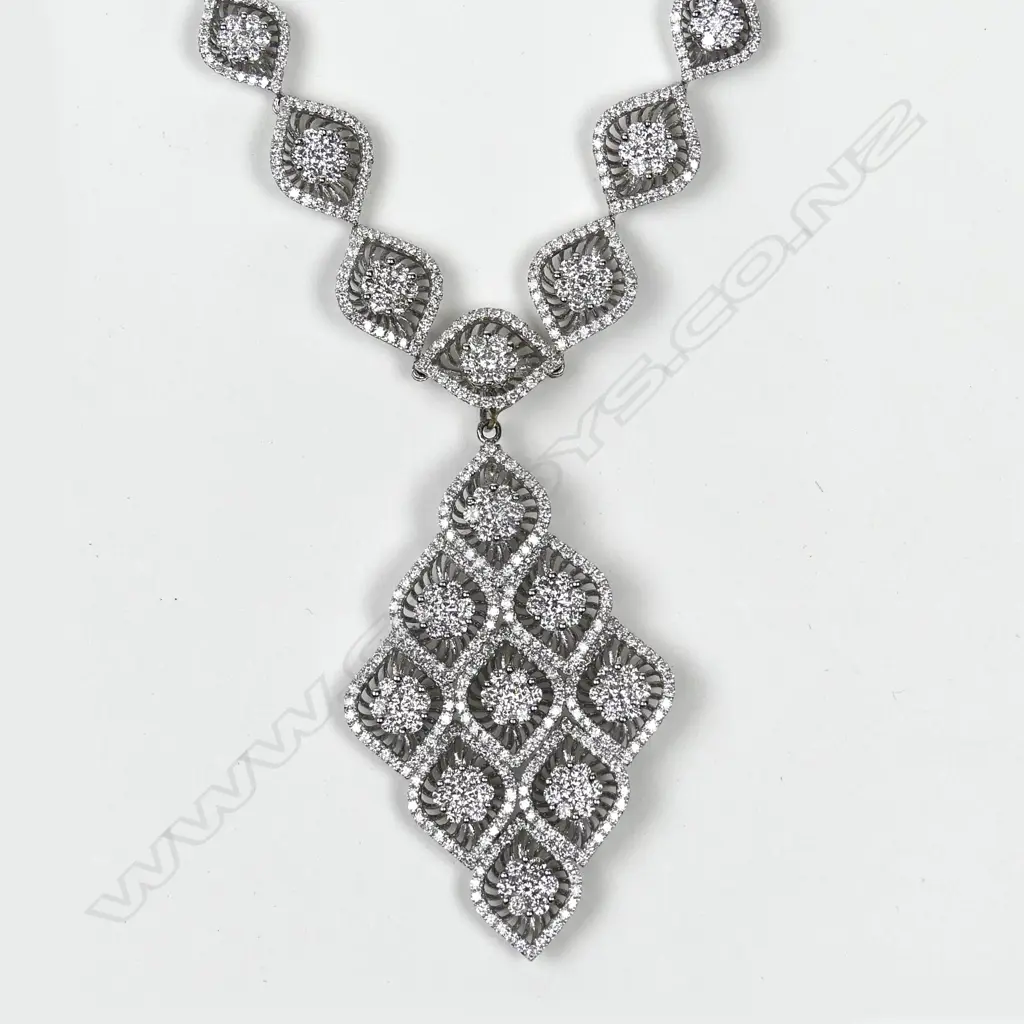 An impressive 18ct. gold white gold and multi-diamond pendant necklace Image 1++