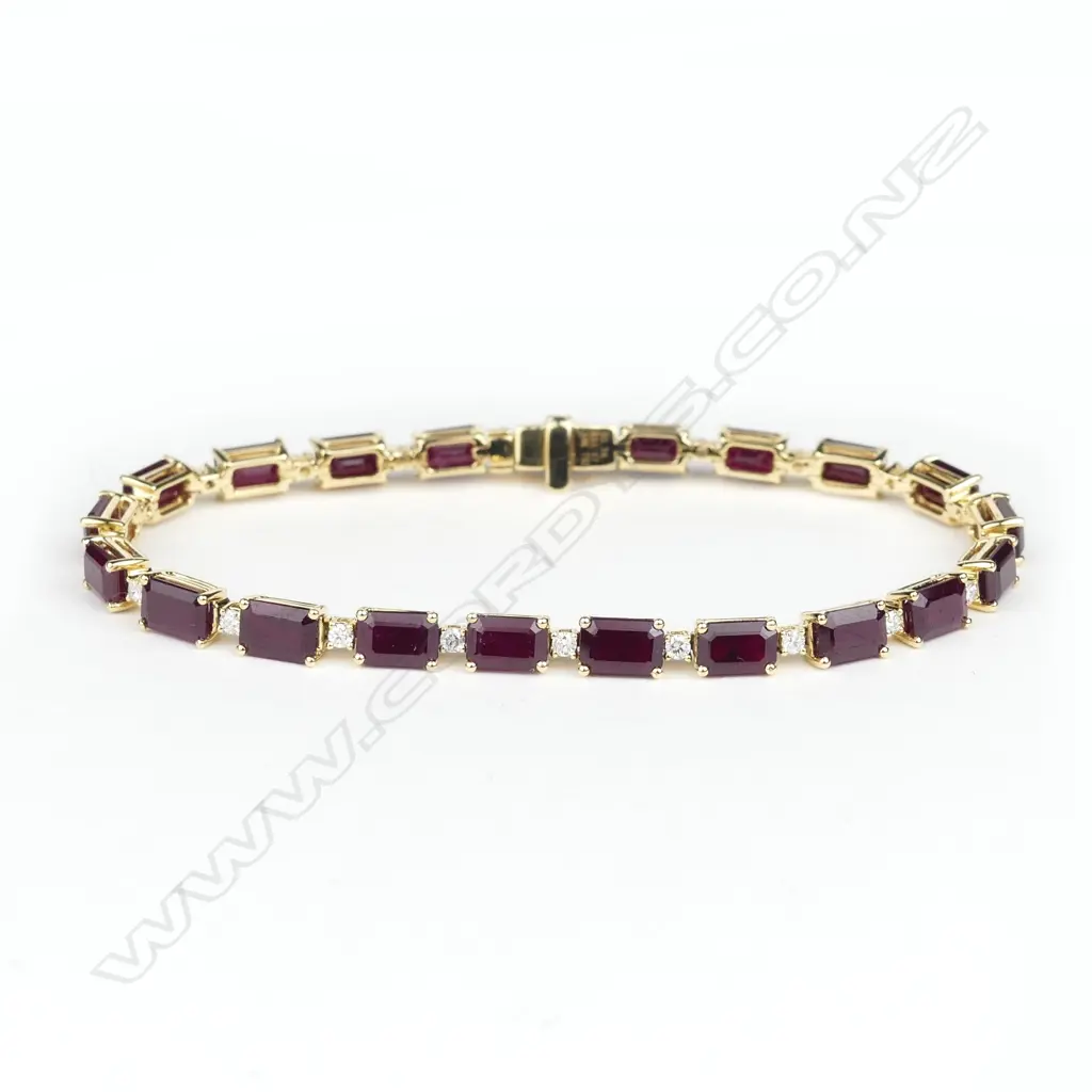 An 18ct gold ruby and diamond bracelet Image 1++