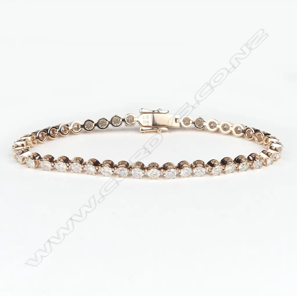 A 14ct rose gold and diamond tennis bracelet Image 1++