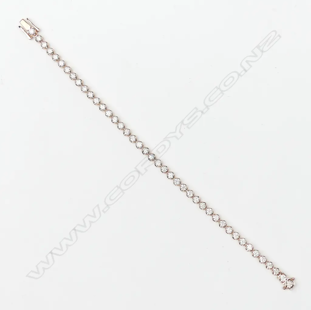 A 14ct rose gold and diamond tennis bracelet Image 1++
