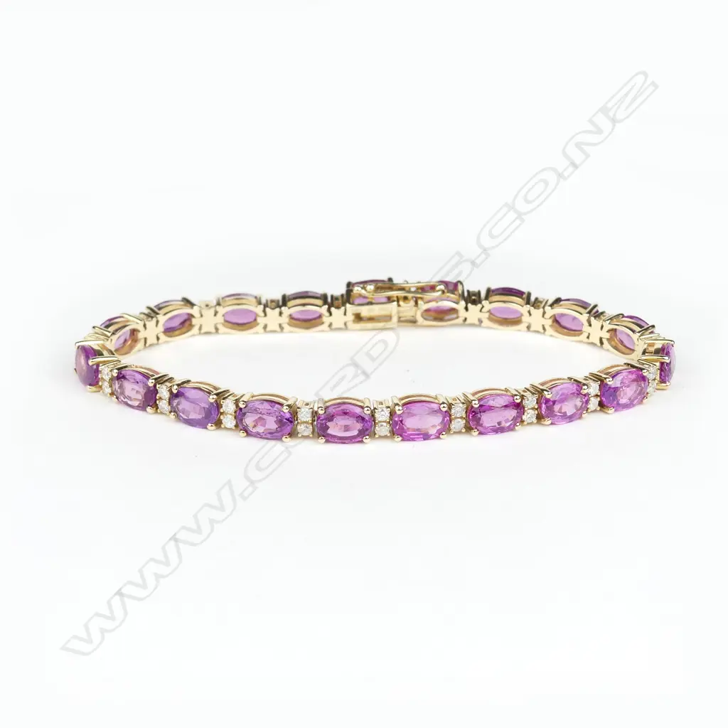 A 14ct gold pink sapphire and diamond bracelet Image 1++