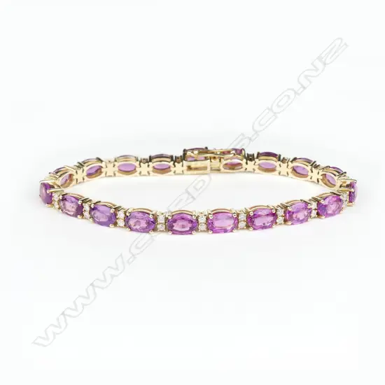 A 14ct gold pink sapphire and diamond bracelet