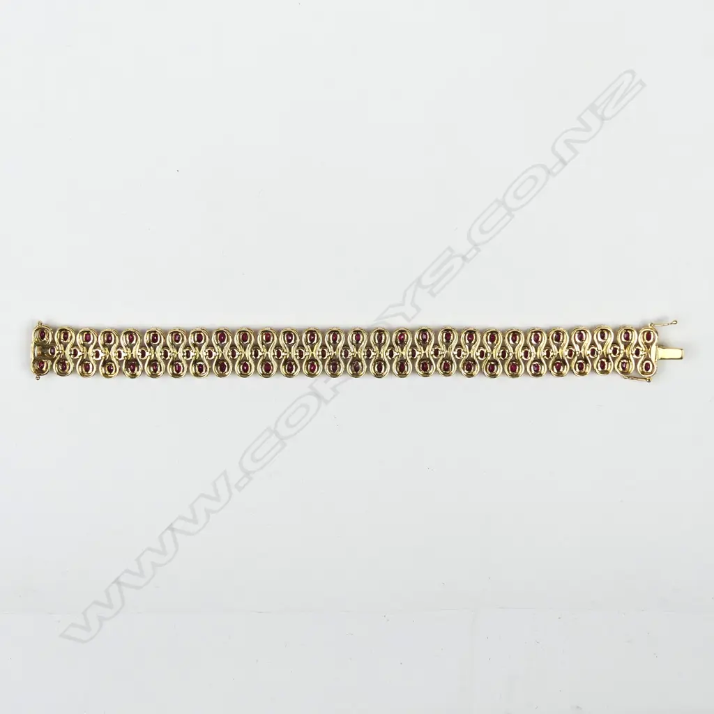 An impressive modern 18ct. yellow gold ruby and diamond bracelet Image 1++