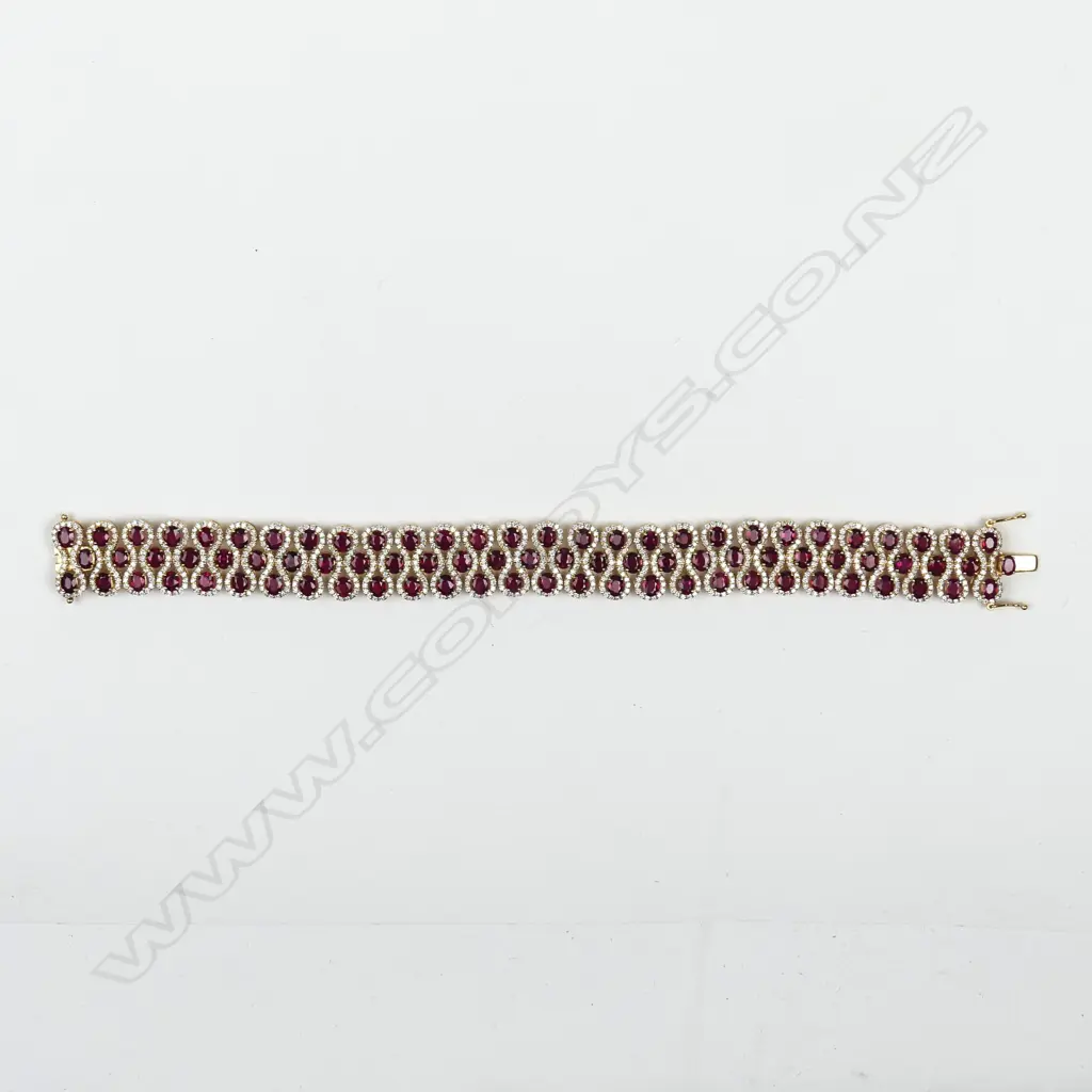 An impressive modern 18ct. yellow gold ruby and diamond bracelet Image 1++