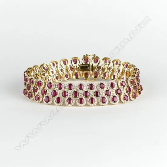 An impressive modern 18ct. yellow gold ruby and diamond bracelet