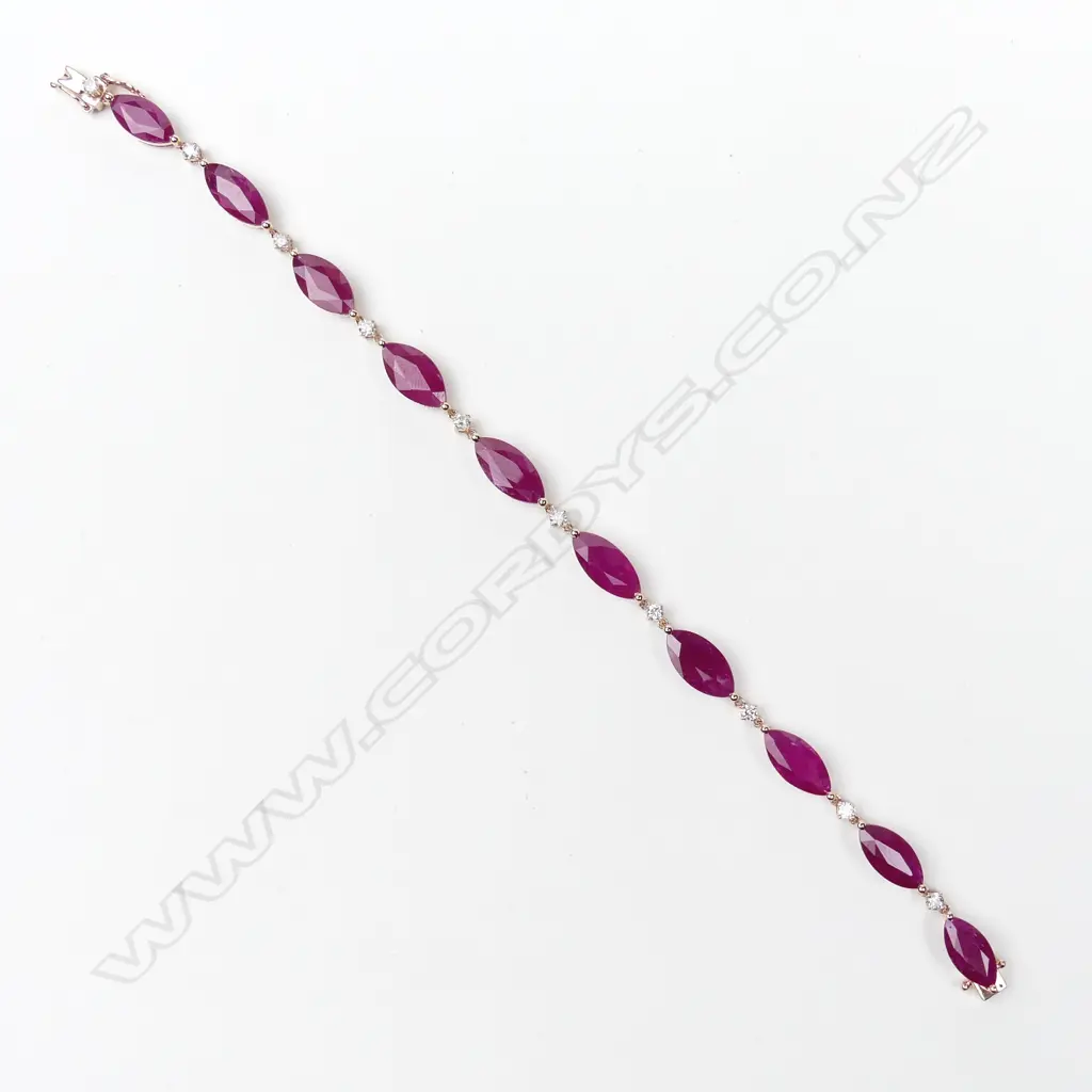 A 14ct rose gold ruby and diamond bracelet Image 1++