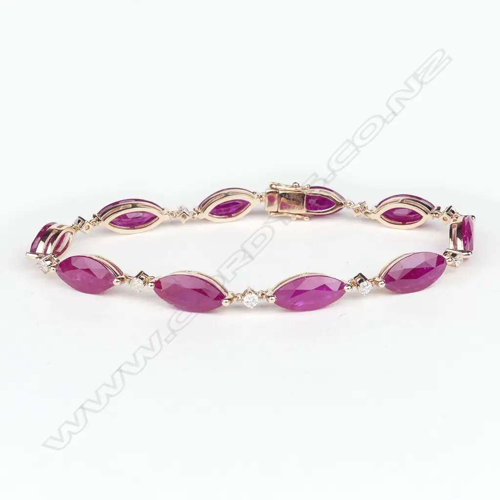A 14ct rose gold ruby and diamond bracelet Image 1++