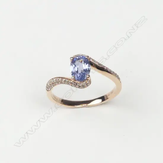 A 14ct rose gold sapphire and diamond ring