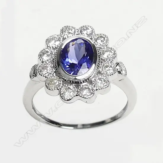 An 18ct white gold tanzanite and diamond ring