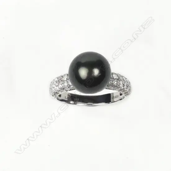 A 14ct white gold pearl and diamond ring