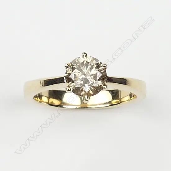 A 14ct yellow gold and diamond solitaire ring