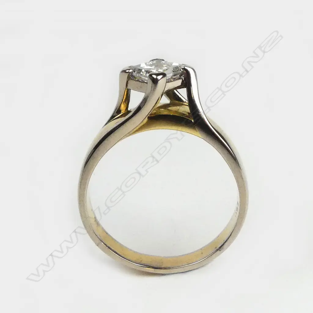 An 18ct gold and diamond solitaire ring Image 1++