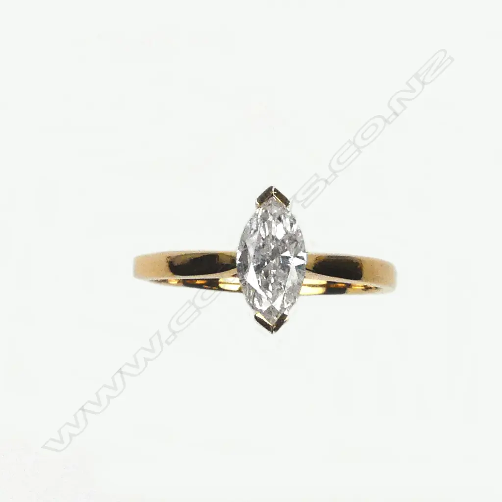 A 14ct gold and diamond solitaire ring Image 1++