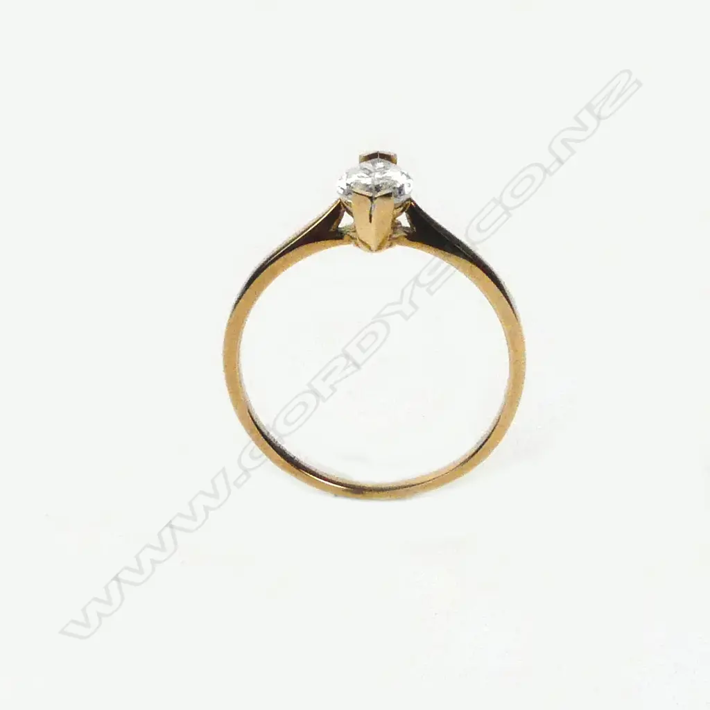 A 14ct gold and diamond solitaire ring Image 1++