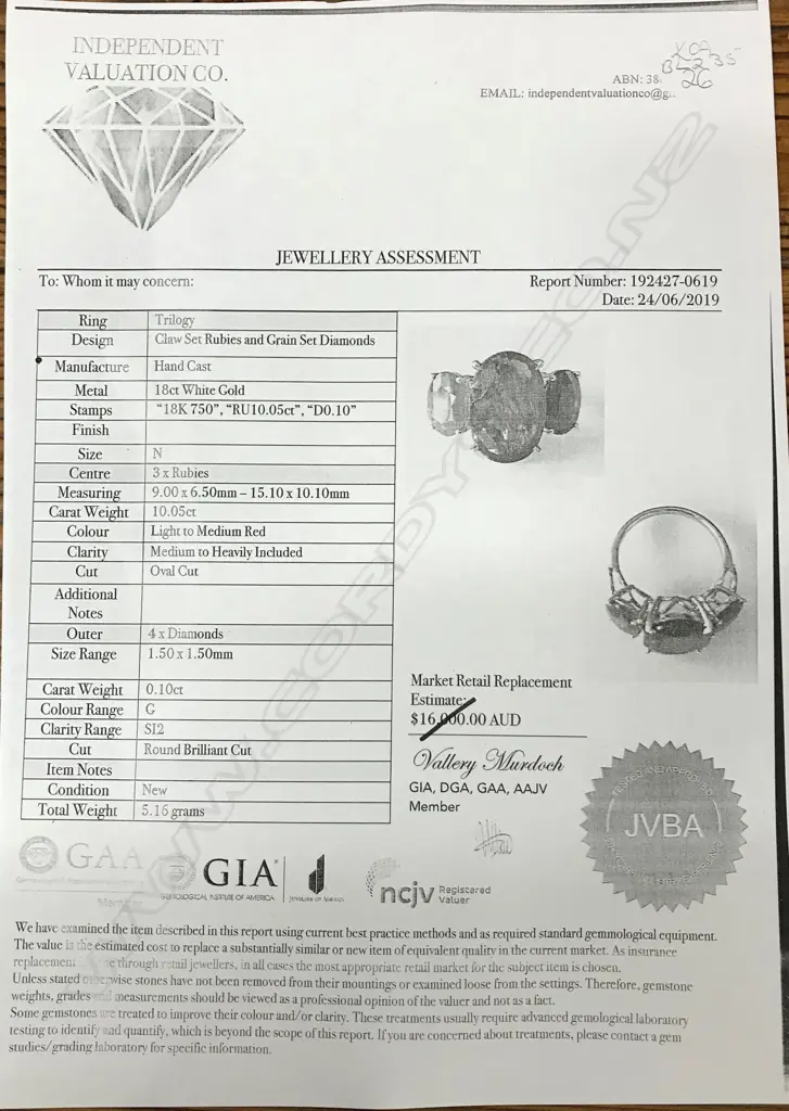 An 18ct white gold ruby and diamond ring Image 1++