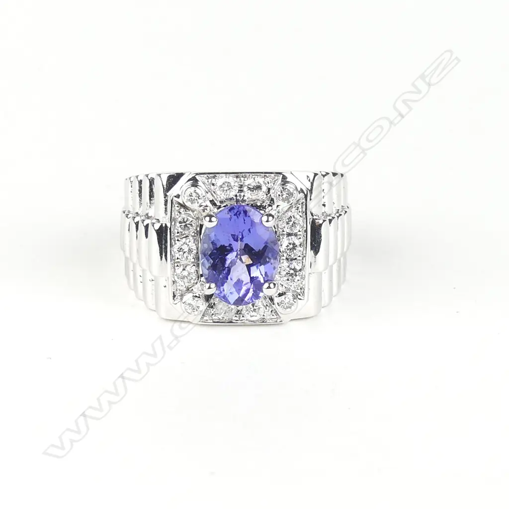 A 14ct white gold tanzanite and diamond gent's ring Image 1++