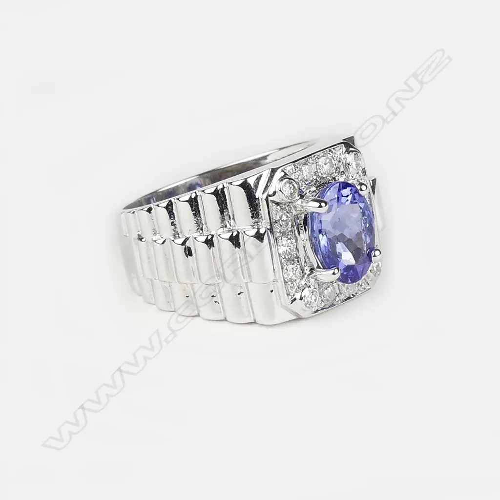 A 14ct white gold tanzanite and diamond gent's ring Image 1++