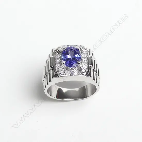 A 14ct white gold tanzanite and diamond gent's ring